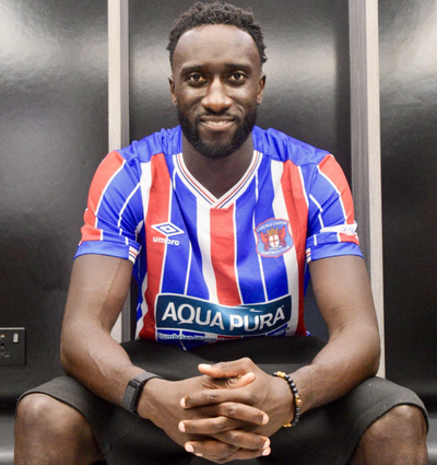 Carlisle United Sign Ugandan Defender Bevis Mugabi on Two-Year Deal