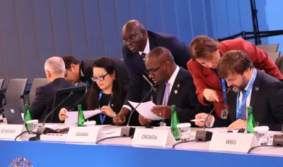 Musasizi Calls for Climate Resilience in Debt Assessments
