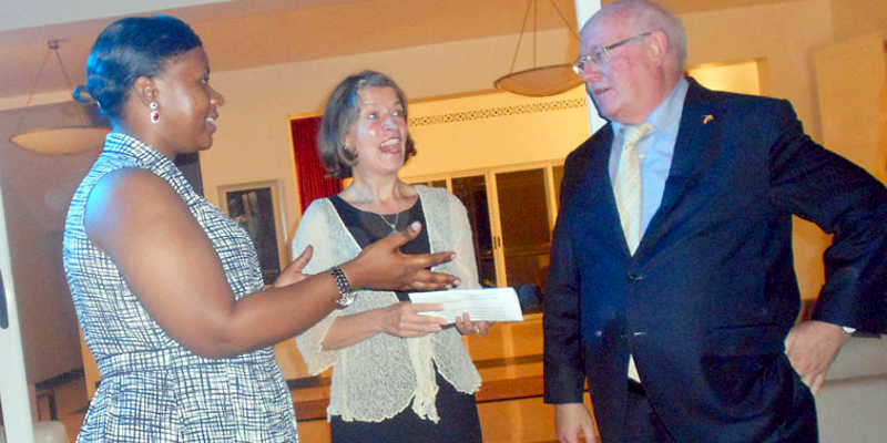 Assistant Karamoja Minister Barbara Nekesa chats with German Embassy Charge d 'Affairs Petra Kochen Dorfer (middle) and Dr. Ralf-Matthias Mohs during a reception to mark the launch of Ushs1.5bn grant for Karamoja