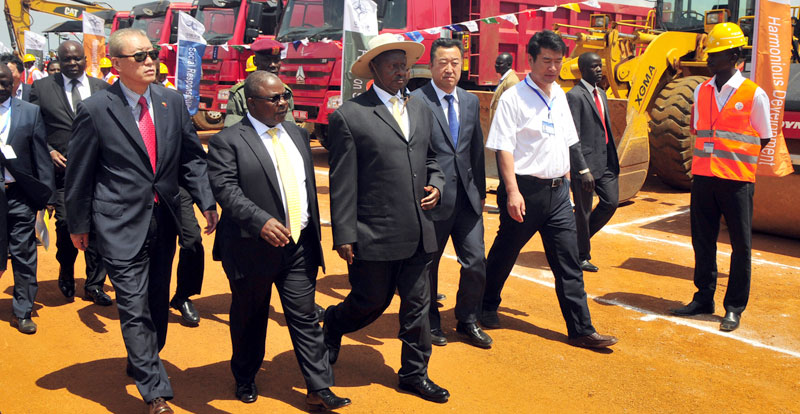 Works and Transport Minister John Byabagambi and President Museveni during the ground breaking ceremony for the expansion of Entebbe International Airport