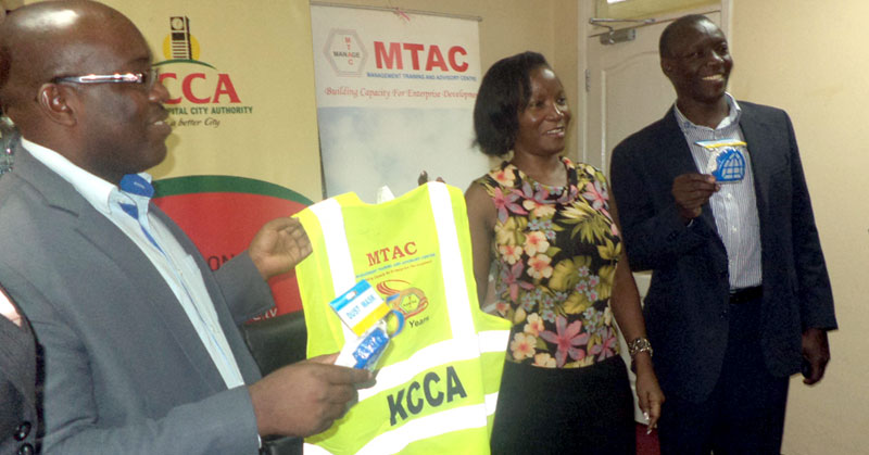 KCCA's Jennifer Musisi with Faith Kinani Communications officer MTAC