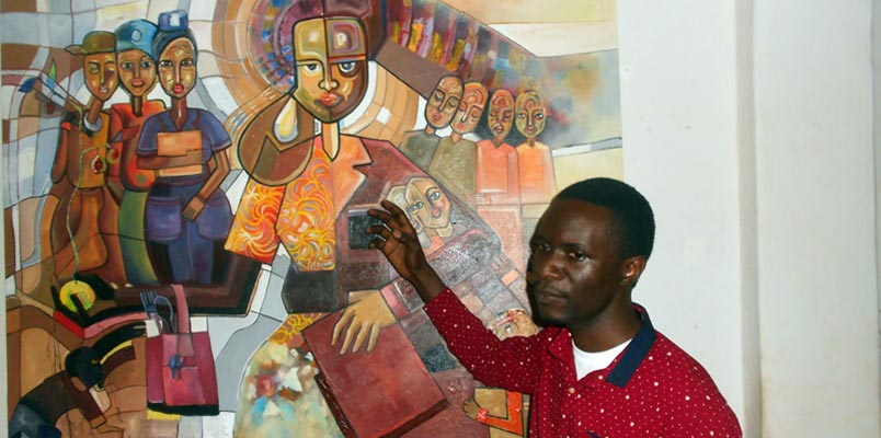 Muwanga Ibrahim explaining his painting