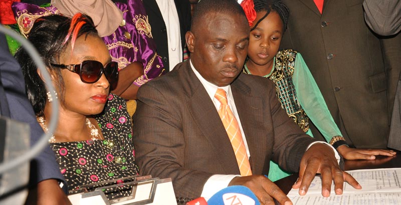 Lukwago flanked by his wife and daughter during the nominations this week