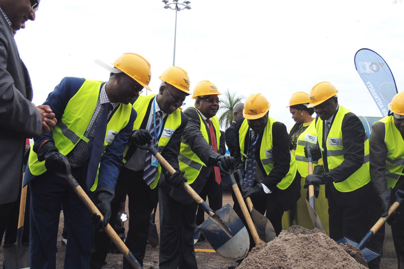 Minister Byabagambi with CAA members of the Board during the site handover ceremony for the expansion of Entebbe International Airport