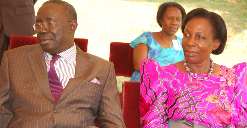 Former Attorney General Peter Nyombi with his wife