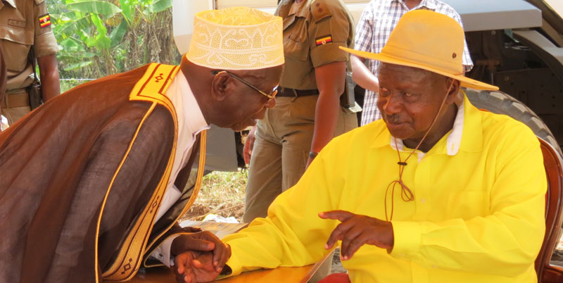Museveni talking to Sheik Obeid Kamulegeya, it has been allaged his pledges are too numerous