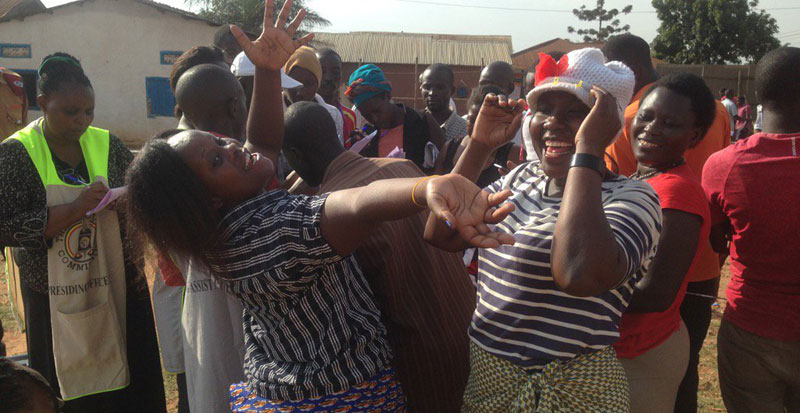 Voters dancing after casting their votes