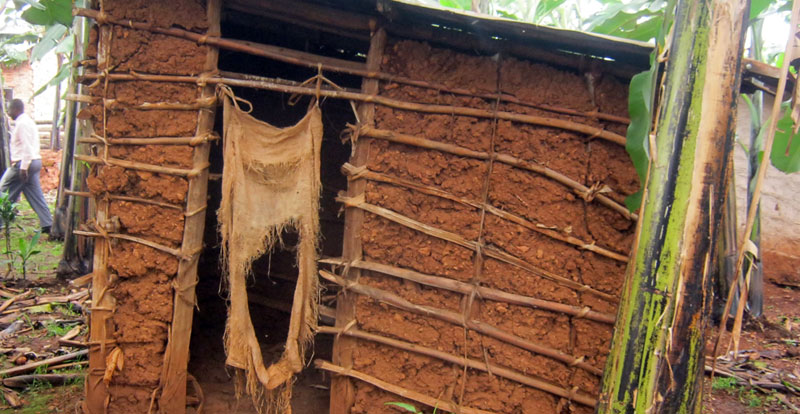 A pathetic pit latrine in one of Kampala's surburbs