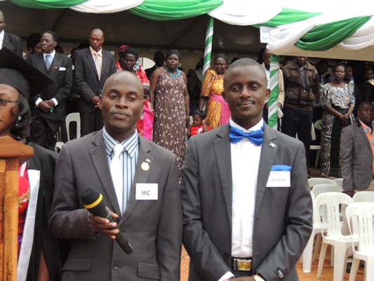 University PRO Julius Ssekatawa (l) and Kampala University Market boss Ronald Busuulwa (Buzi)