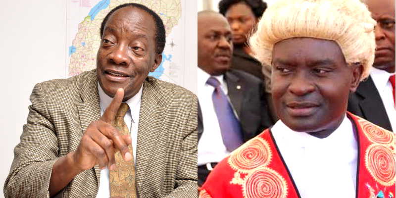 Left: Out-going EC boss Eng. Badru Kiggundu and In coming EC boss. Justice Byamukama