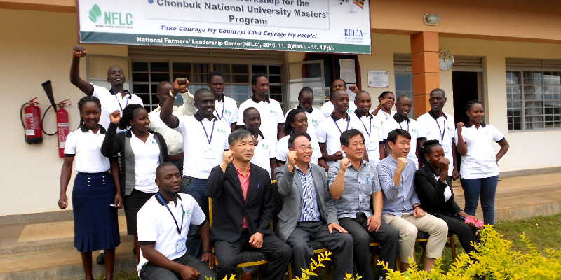 Professors from Chonbuk University and lucky winners of Masters Programme at Chonbuk university pose for a photo at the end of the Orientation Workshop at Kampiringisa, Mpigi district