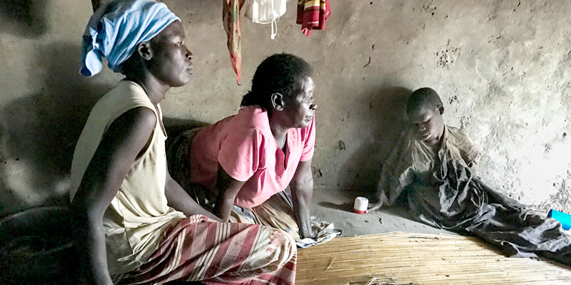 Nodding disease victim with relatives