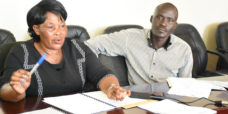 Soroti University secretary Ruth Achimo and Communications officer Nyene Juma Hassan addressing the media about the land saga with squatters