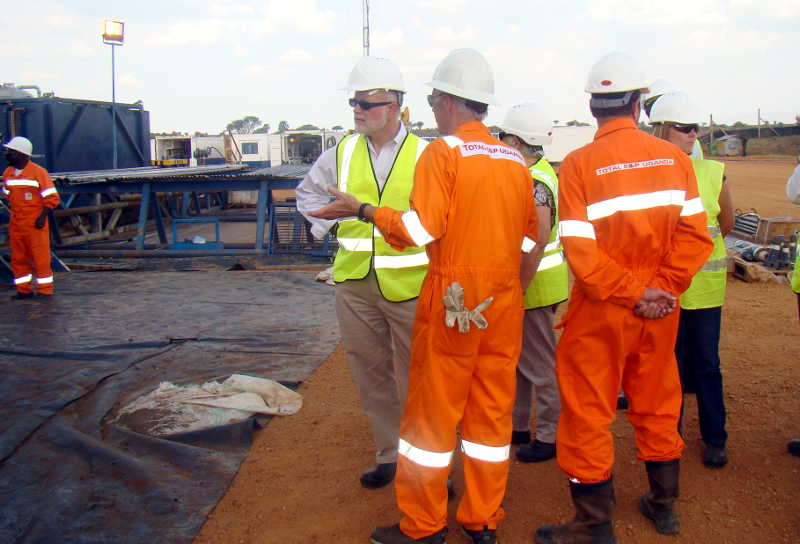 Former US Ambassador Scott DeLisi touring the waste oil storage facility in Western Uganda. His tour was part of the Oil Sector Activity. Photo: US Mission Uganda 