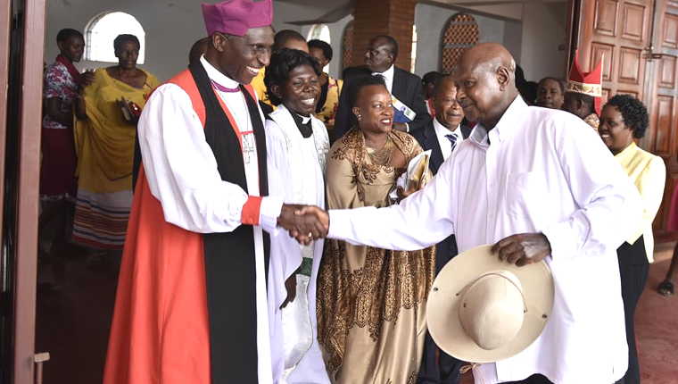 Museveni with Bishop Reuben