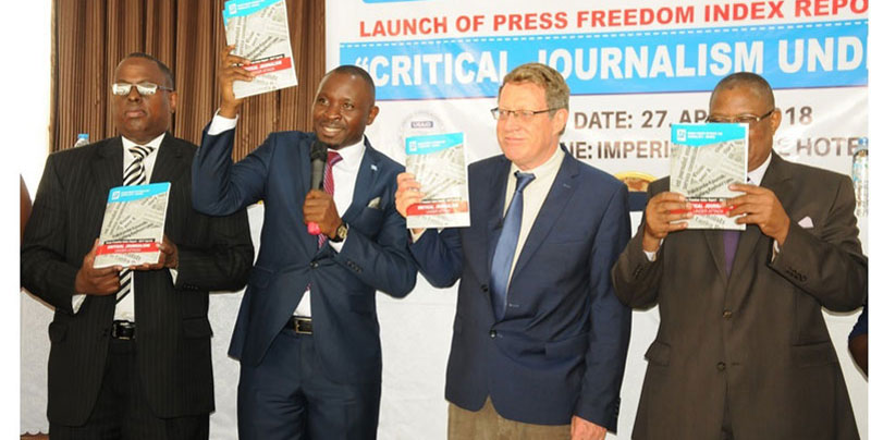 Ambassador Paderson (R) with Robert Ssempala, (Center) Coodinator of HRNJ Uganda and Donald Rukare of Freedom House at the launch of the Press Fredom Index 2017, this week
