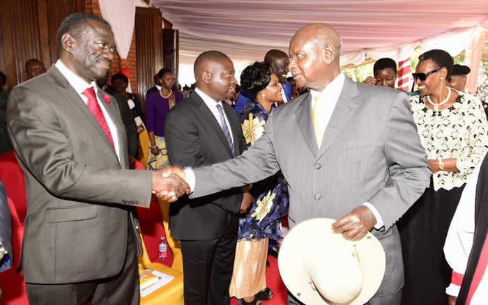 President Museveni and his long-time opponent Kizza Besigye look set to have another contest for the 5th time. Here they shook hands at the two leaders met at the Protestants celebrations  in Namugongo where Kigezi Dioceses were the main organisers