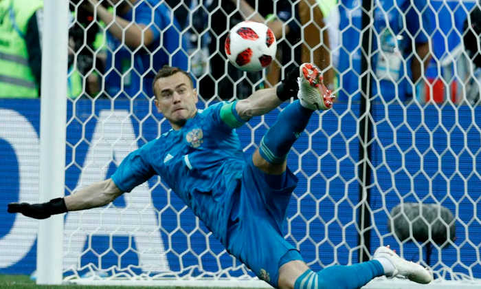 Russia's goalkeeper Igor Ankinfeev saved two spot kicks and effectively knocked Spain out of 2018 Fifa World Cup