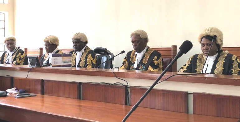 Constitutional Court Justices while delivering their judgement on July 26, 2018 in Mbale