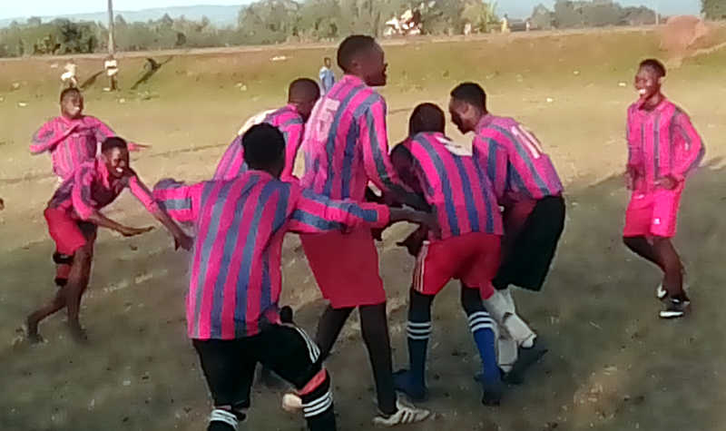 Players of Kinyoli FC celebrate a goal