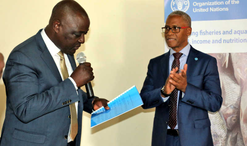 Agriculture Minister Vincent Ssempijja with FAO country Rep Antonio Querido at the launch of the project