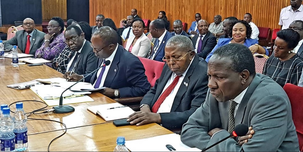 Minister Kasaija and BoU chiefs appearing before COSASE