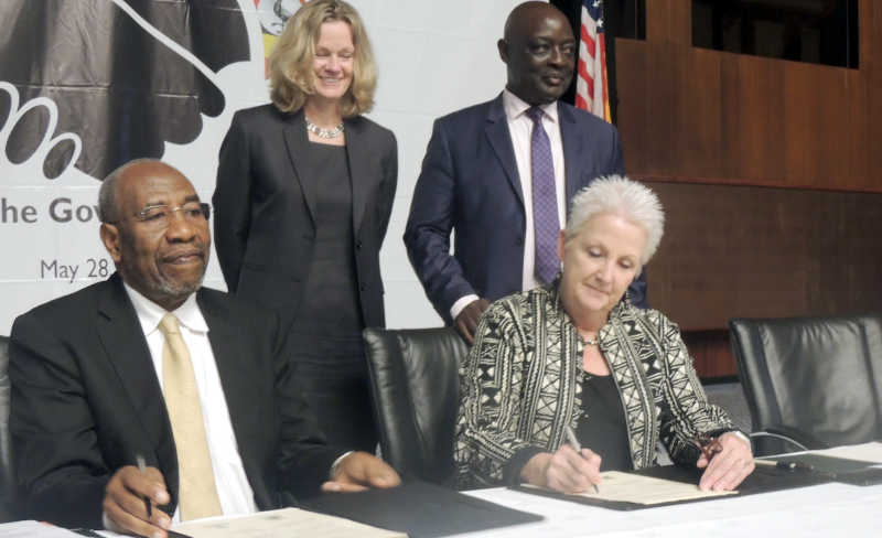 Dr. Ruhakana Rugunda with US Ambassador Deborah Malac at the Declaration of Partnership Agreement signing in Kampala May 28, 2019