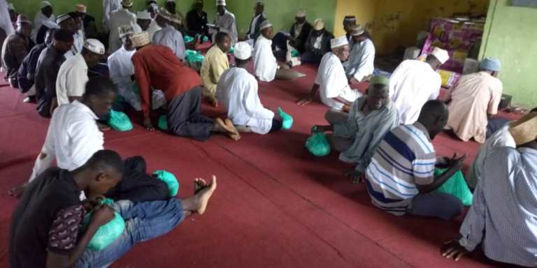 Muslims with their donations