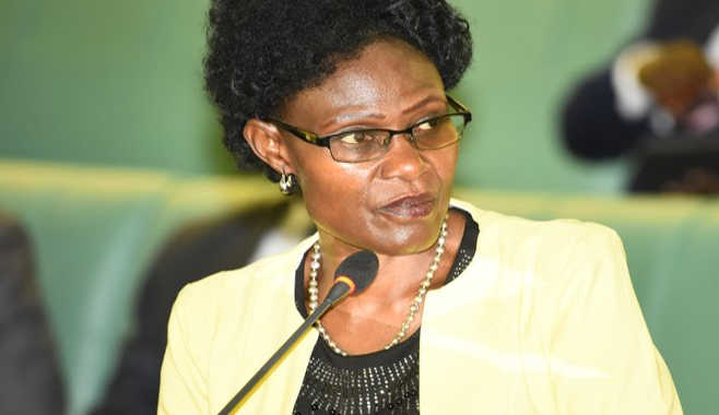 Deputy Kampala Minister Benny Namugwanya making her statement in Parliament this week