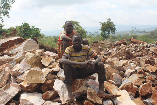 Young boys seen at the stone quarrying site