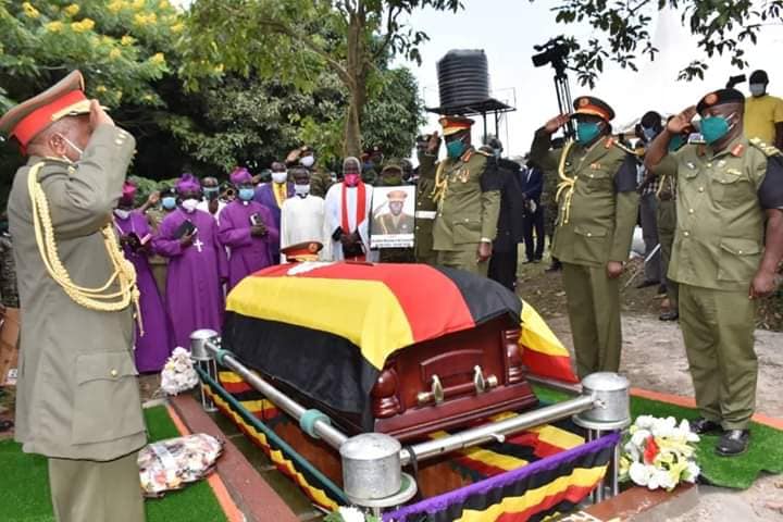 RIP: The casket containing the remains of Maj. Gen. Kasirye Ggwanga as it was being lowered into his grave at Nkene in Busujju, Mityana district