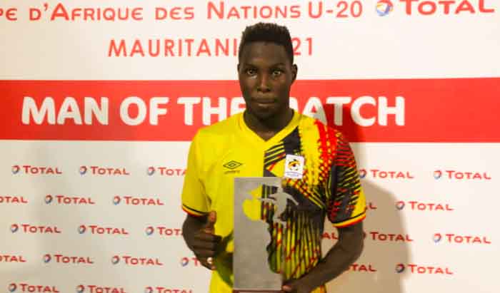 Caption Striker Kakooza with his man of the Match Accolade