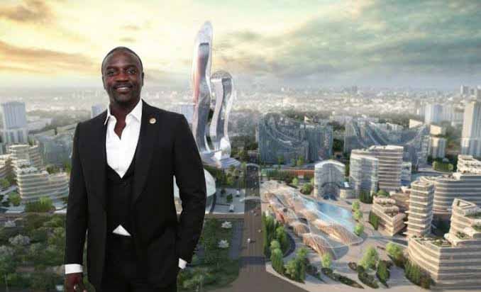 Akon, standing behind an artistic impression of his futuristic Akon City launched three years ago but is yet to get off the ground.