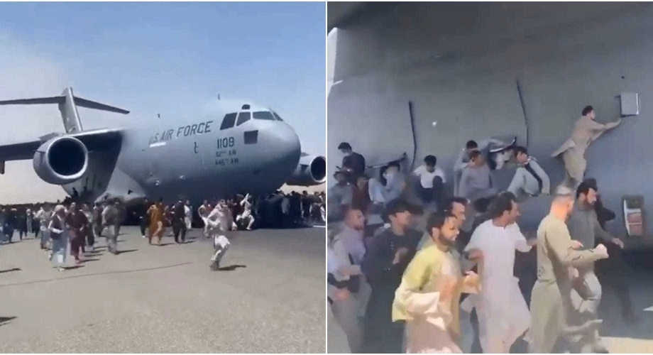 People latch onto a moving aircraft