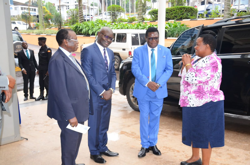 Prime Minister Robinah Nabbanja (right) Minister Norbert Mao, EC Chairman Justice Byabakama 3rd right at the unveiling of the 2026 Uganda electoral roadmap at Hotel Africana in Kampala August 2,2023