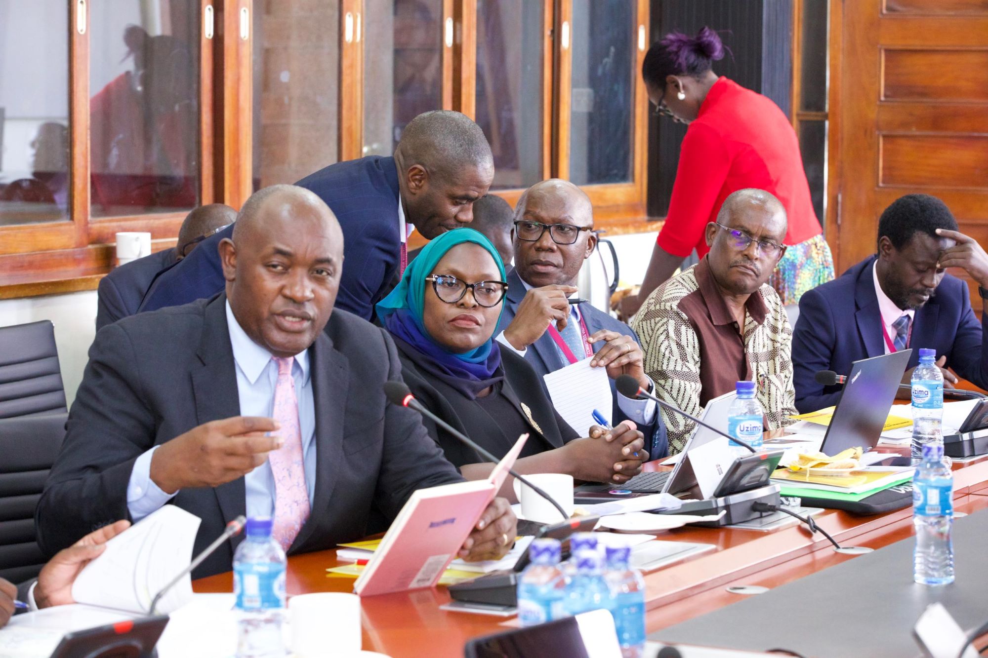 CT and National Guidance Minister, Hon. Chris Baryomunsi (left) leads the Ministry team before the House Committee on ICT on Thursday 3 April 2025