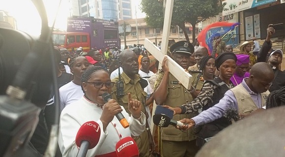 Canon Dr Rebecca Magret Nyegenye preaching near Equatorial Mall to city residents.