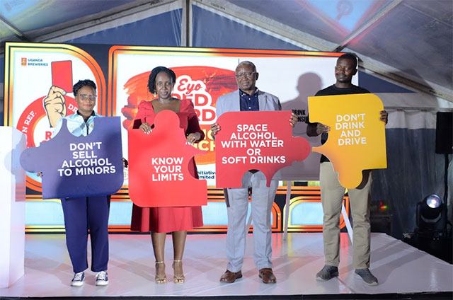 MIDDLE: Brenda Kobutungi, UBL Corporate Relations Manager Positive Drinking and Internal Communication and The Secretary General of the Uganda Red Cross Society, Robert Kwesiga
