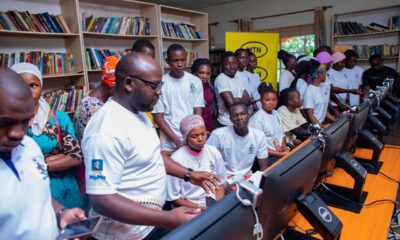 Teenage mothers interact with MTN’s donated computers at the Inebantu Lady Alice Mulooki Memorial Library and ICT Centre