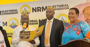 Sodo Aine Kaguta (C) being nominated at the NRM EC offices in Kampala on Thursday.