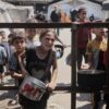 Palestinians in Gaza queue for food distributed by a charity organisation, Gaza City, Gaza, 14 July 2025. Photograph: Anadolu/Getty Images