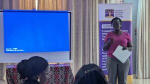 Immaculate Owomugisha, Executive Director of the Centre for Women Justice Uganda, addresses journalists during a training workshop focused on combating gender misinformation and promoting balanced reporting