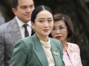 Thailand's Prime Minister Paetongtarn Shinawatra arrives at Government House for a cabinet meeting in Bangkok, Thailand, Tuesday, July 1, 2025. (AP Photo/Sakchai Lalit)