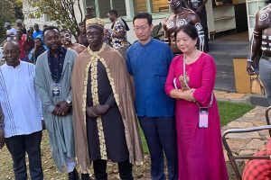 Chinese Ambassador Zhang Lizhang and his wife share a moment with Artist Master Ntakky (right) during his solo exhibition at Nommo Gallery, Kampala — August 1, 2025.